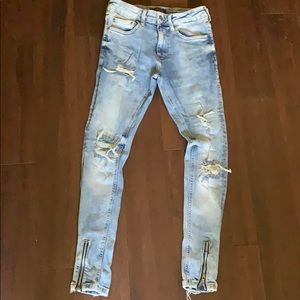 Ripped skinny light wash denim jeans